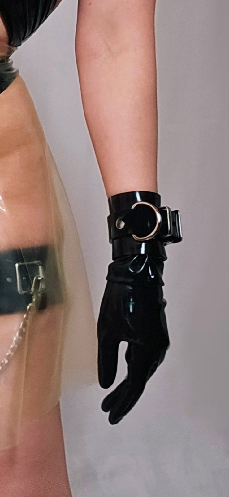 Wrist Restraints — handcrafted latex by TOX Latex, made to order in Canada, designed as a statement piece for eveningwear and high-fashion